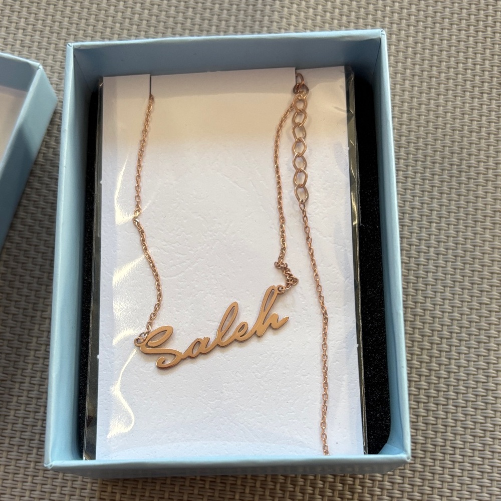 Elegant rose Gold Necklace says “saleh”. NWT